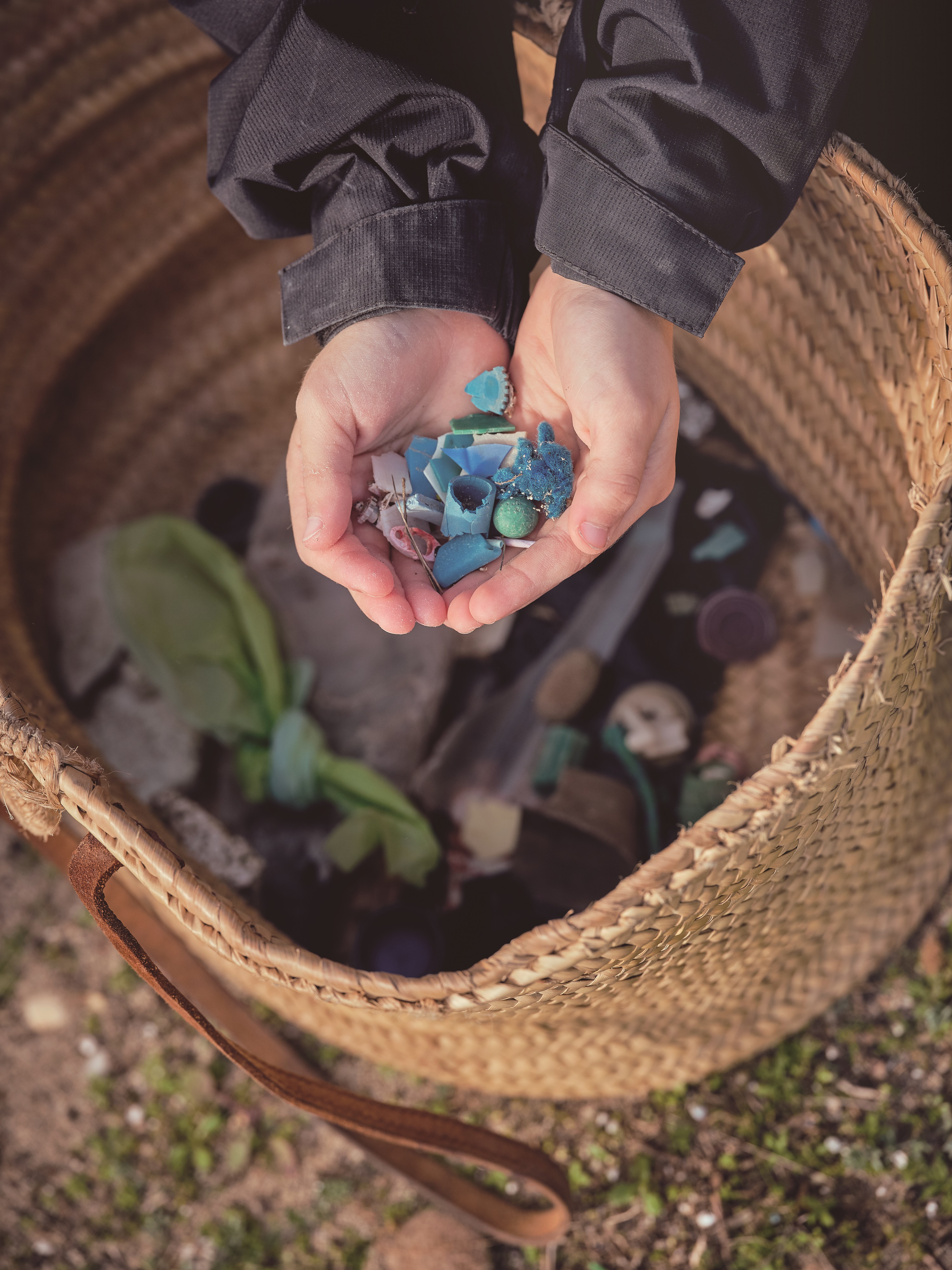 p-48-crop-boy-with-pieces-of-plastic-for-recycling